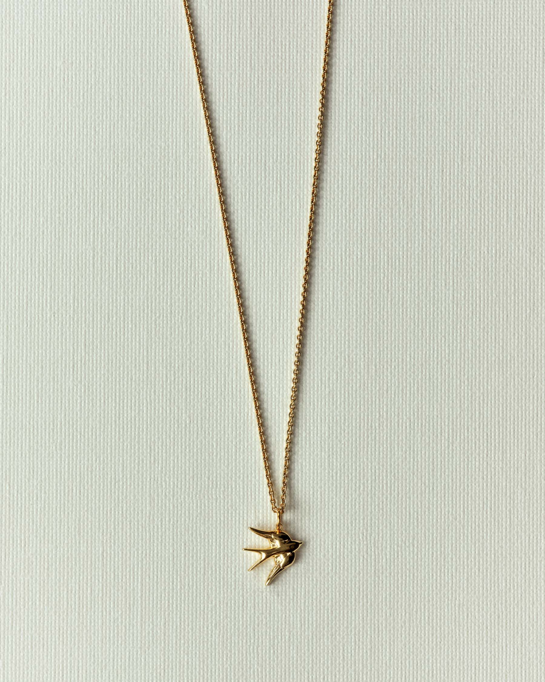 Embossed swallow necklace