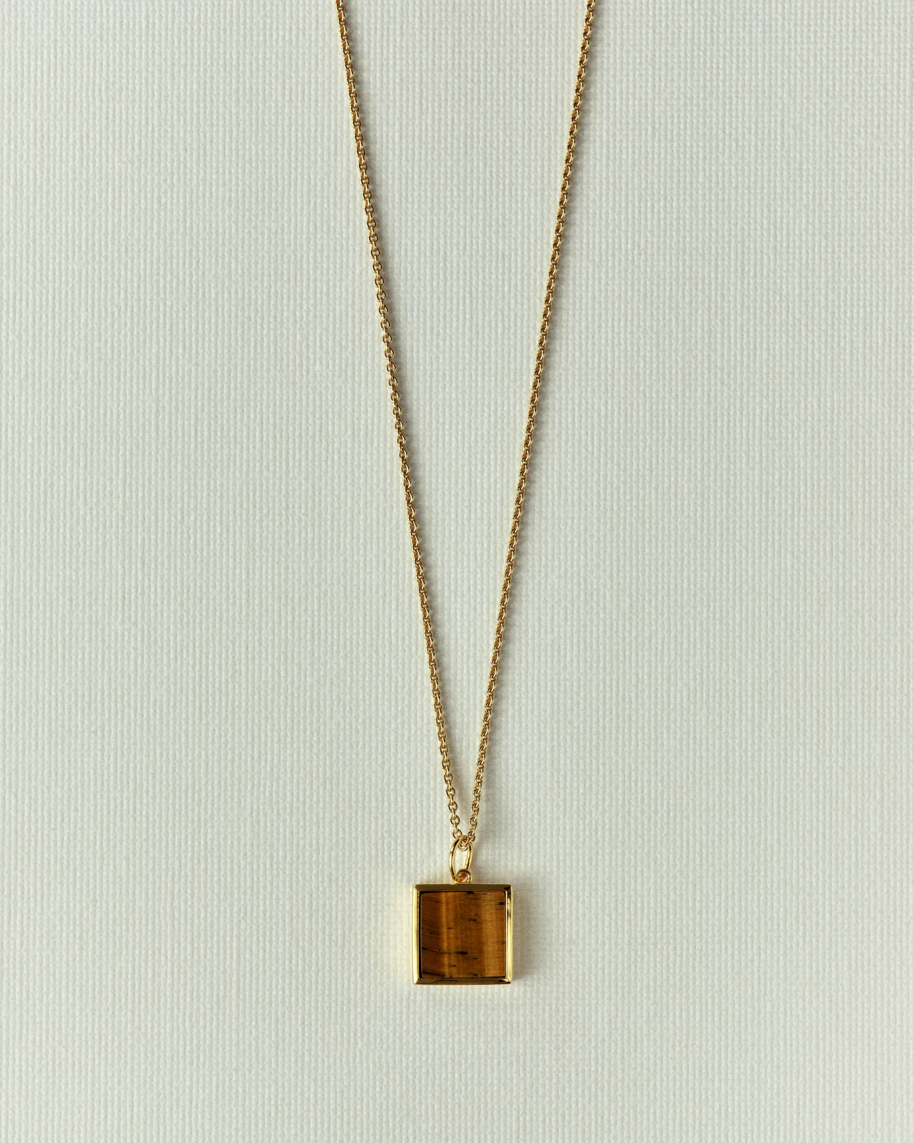 Pendentif carré serti pierre