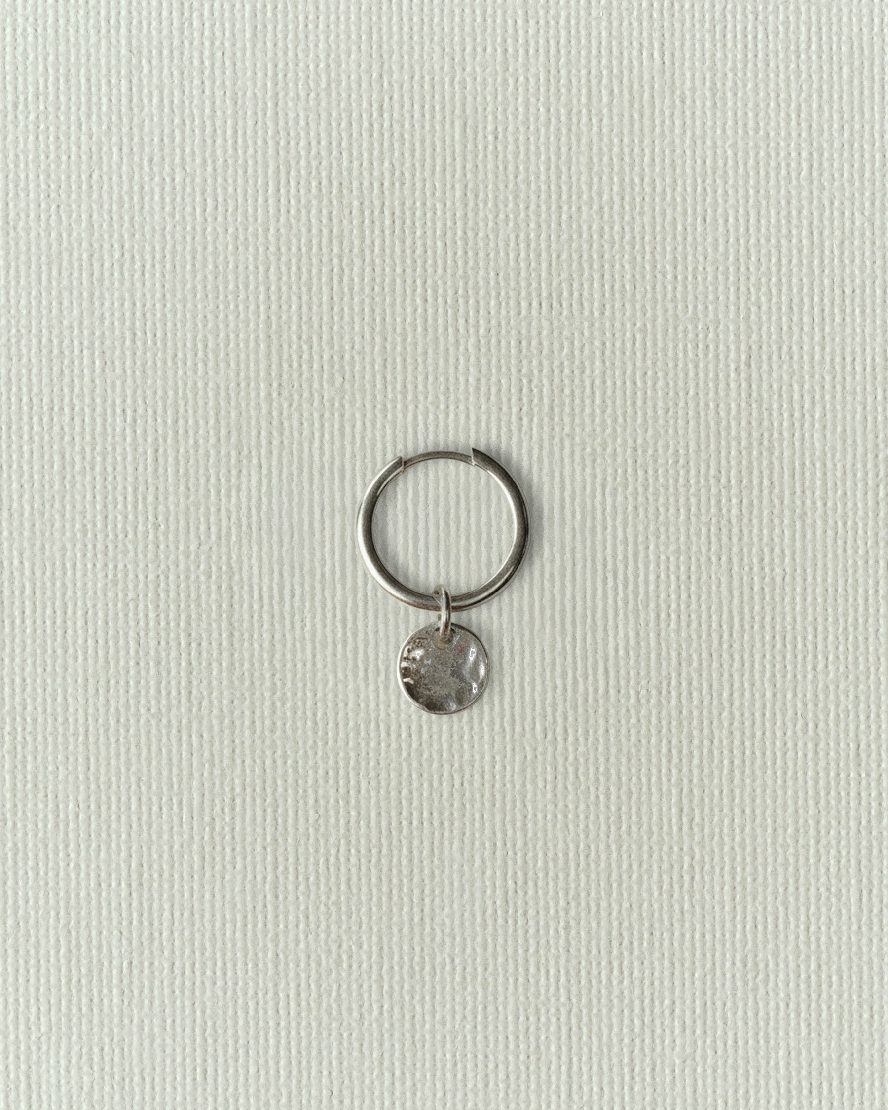 Hammered medal earring