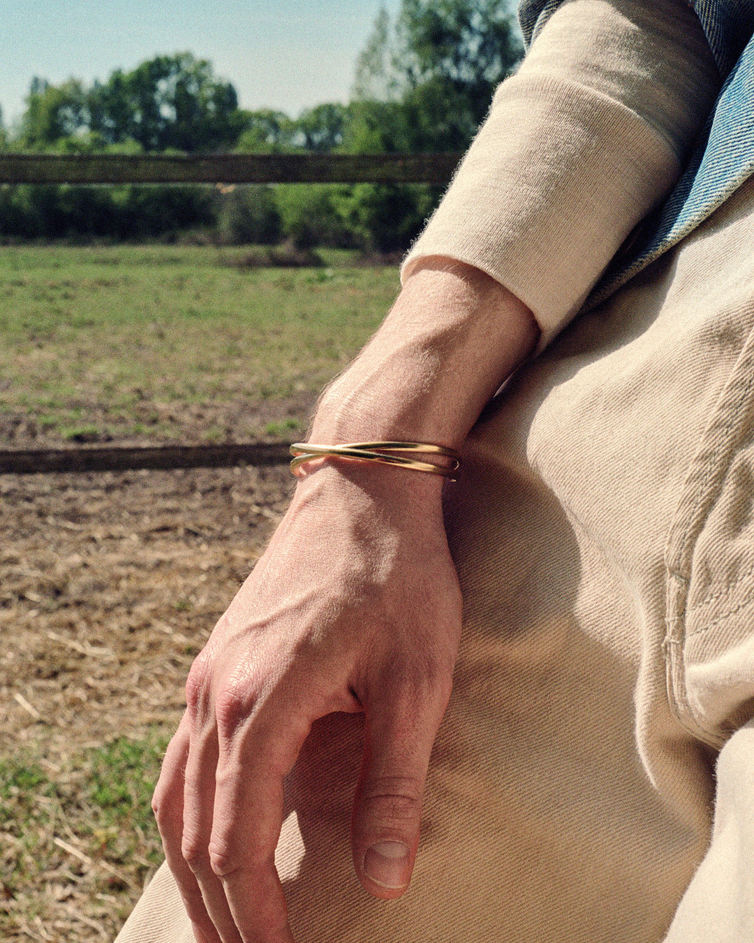 Intertwined flat wire cuff