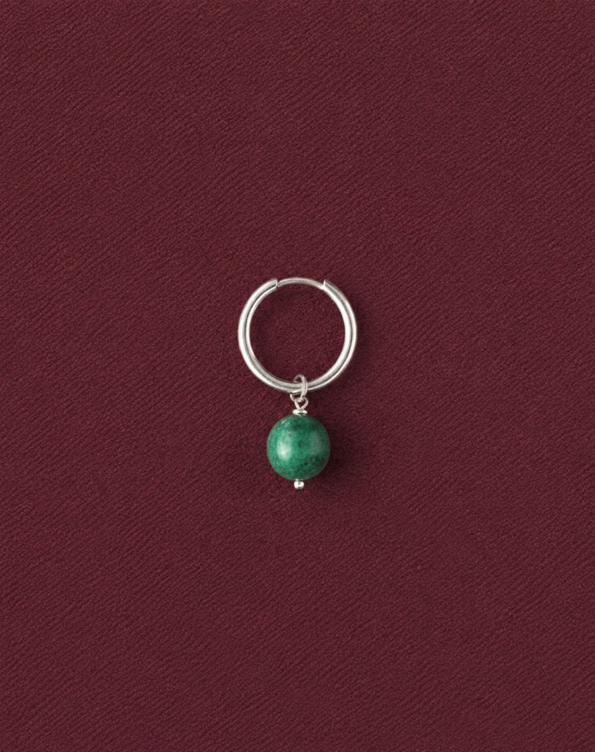 Mottled jade-green bead version, single silver hoop on burgundy fabric