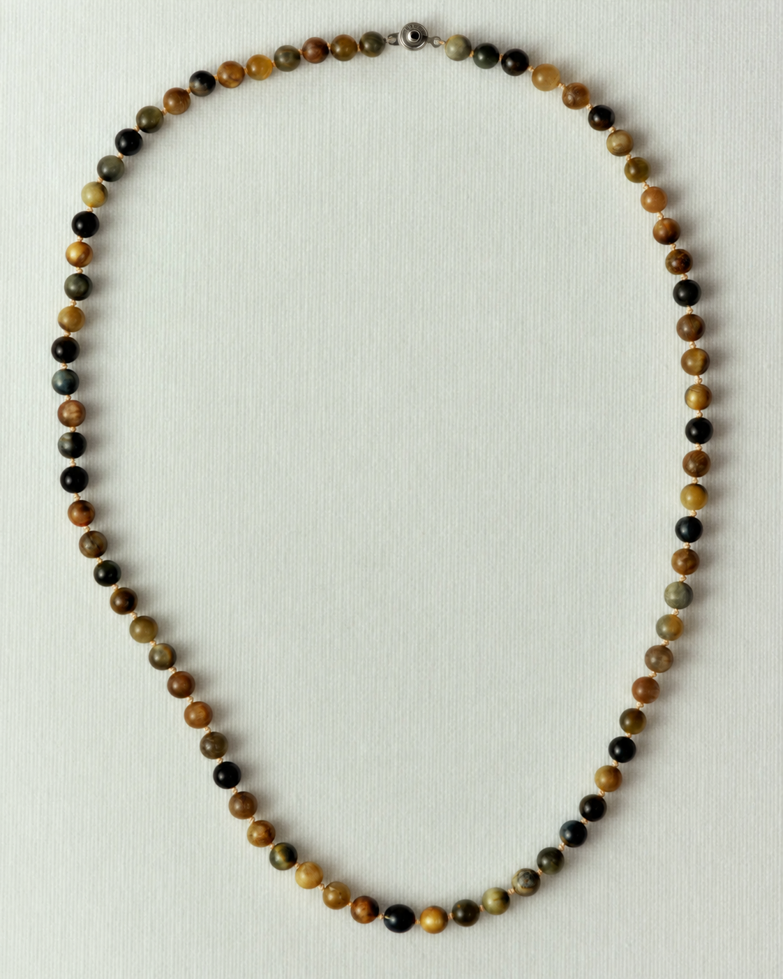 Iron eye bead necklace with a silver clasp
