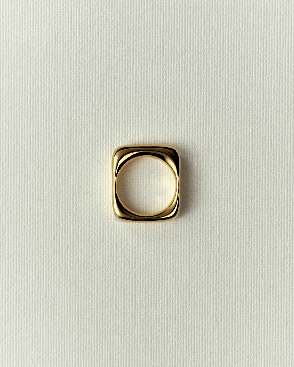 The same in gold, polished edges and a round inner band