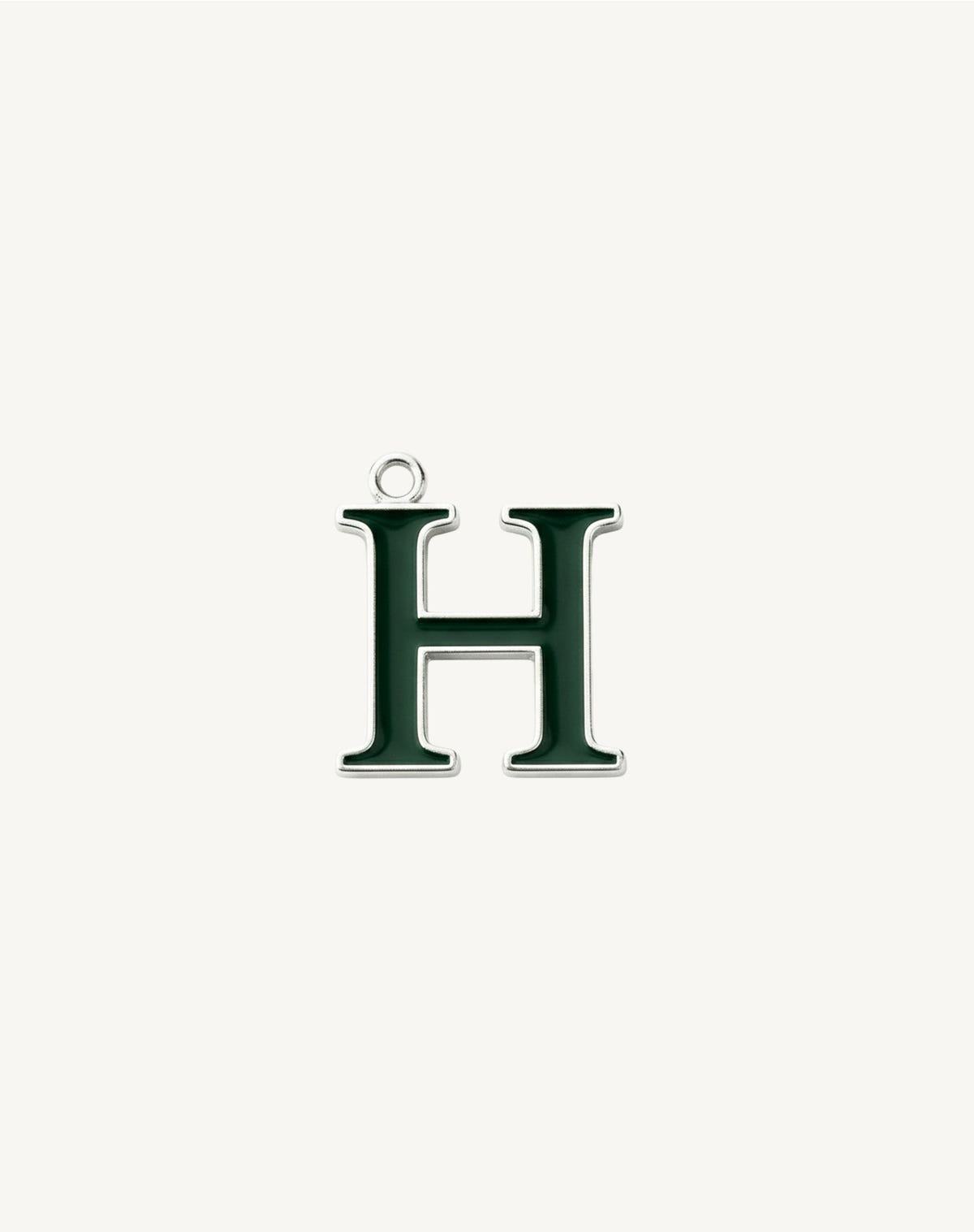Letter H, two uprights joined by a bar, dark green enamel outlined in silver
