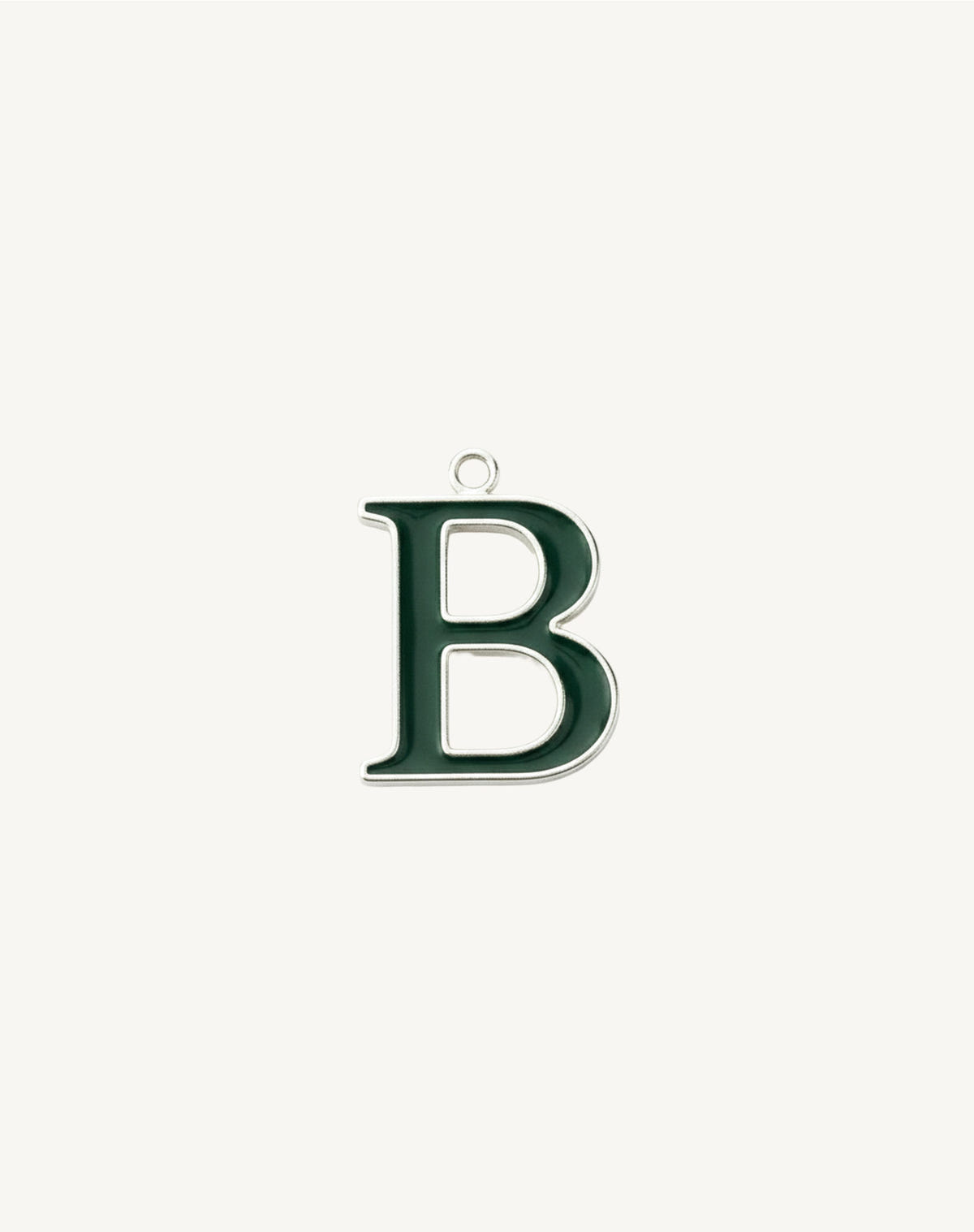 Letter B in dark green enamel, bright silver outline and small ring, cream background