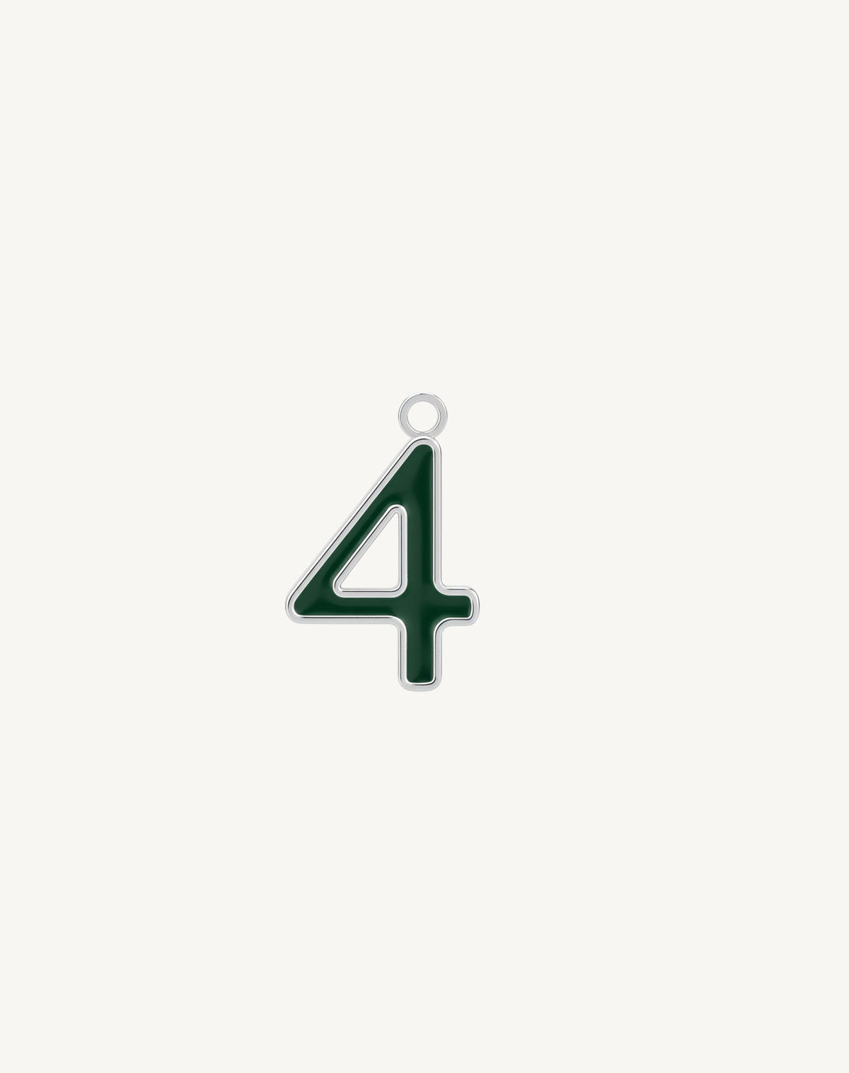 Angular four, dark green enamel set in silver, close-up on cream